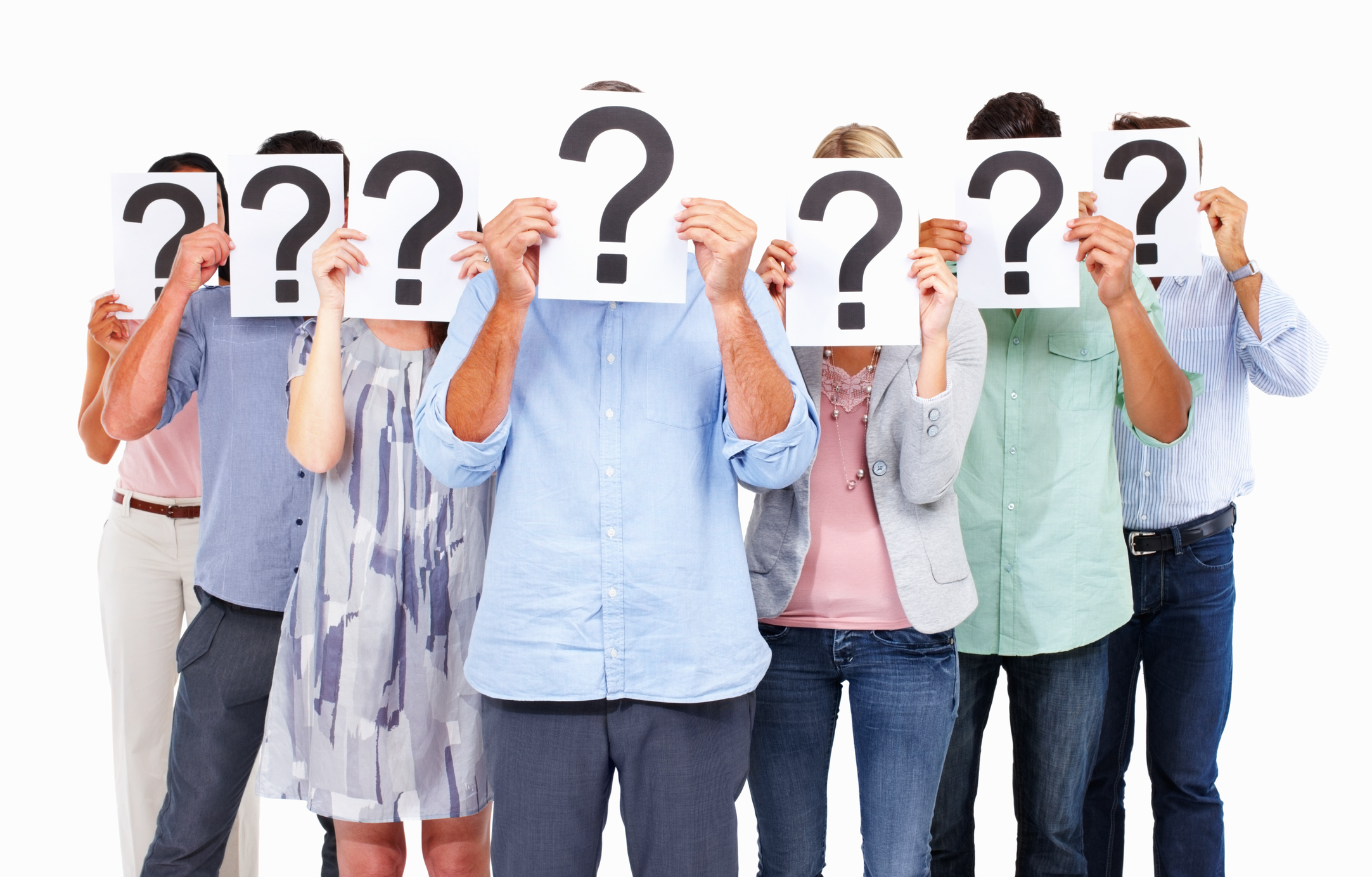 Business people standing with question mark on boards