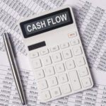 Cash flow word on calculator, cashflow inscription